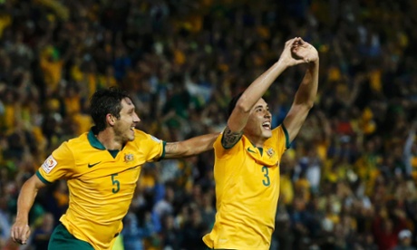 Australia's Jason Davidson (R) celebrates with Mark Milligan 