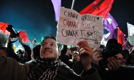 Syriza supporters celebrated the party's victory in the Greek parliamentary elections in front of the University of Athens.