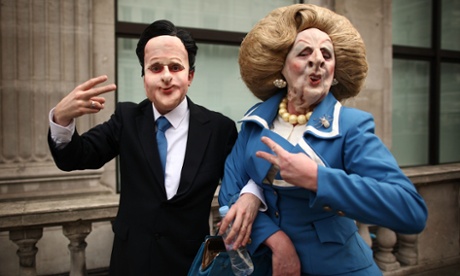 Protesters dressed as  David Cameron and Margaret Thatcher