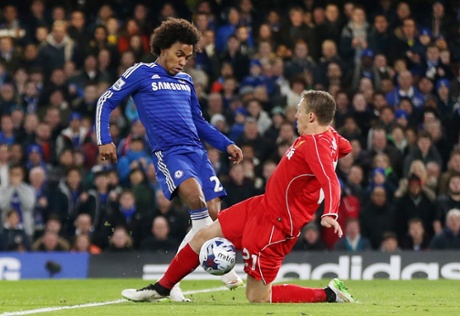 Chelsea's Willian's shot hits the hand of Liverpool's Lucas Leiva but despite Chelsea protestations the referee says no penalty.