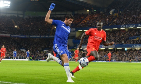 Diego Costa attacks down the wing under the watchful eye of Mamadou Sakho
