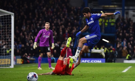Martin Skrtel clears from Diego Costa ...