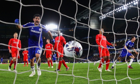 Diego Costa slams the ball in the back of the net to celebrate after Ivanovic scored.