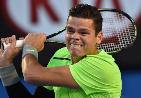Milos Raonic plays a shot.