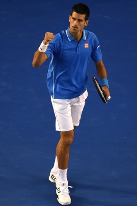 Djokovic celebrates winning the first set.