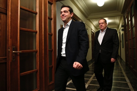 Greek Prime Minister Alexis Tsipras arrives for the first meeting of the new cabinet in the parliament building in Athens January 28, 2015.