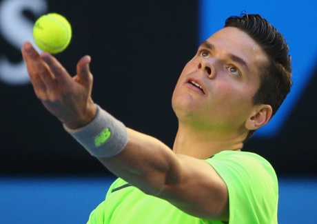 Milos Raonic serves.