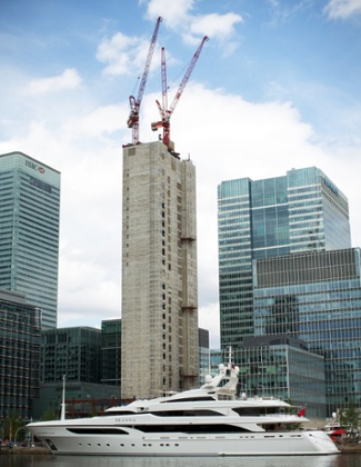 A luxury yacht is moored in the London docklands on day one of the London 2012 Olympic Games.