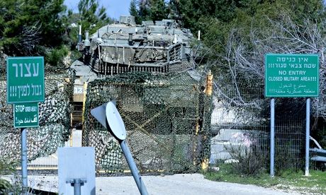 An Israeli tanks stands on the border with Lebanon in northern Israel