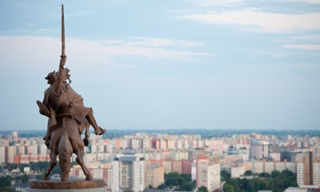 Statue of King Svatopluk with Bratislava in the background.