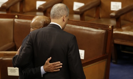 Attorney General Eric Holder, right, and Rep. John Lewis, D-Ga., leave  Capitol Hill in Washington, Tuesday, Jan. 20, 2015, after President Barack Obama's State of the Union address.