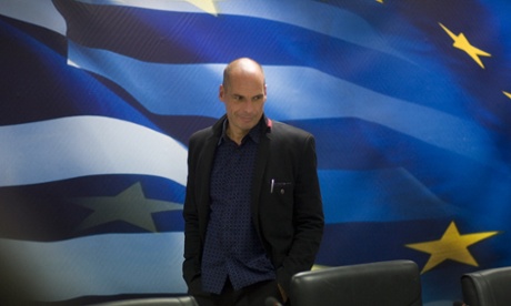 Greece's new Finance Minister Yanis Varoufakis arrives for a handover ceremony at the Finance Ministry in Athens.