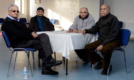 Chandu Pandya, second from the left, plays cards with friends at the Brent Indian Association.