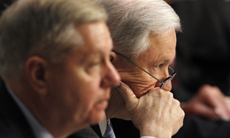 Sen. Jeff Sessions, R-Alabama, right, and Sen. Lindsey Graham, R-S.C., listen as attorney general nominee Loretta Lynch speaks on Capitol Hill in Washington, Wednesday, Jan. 28, 2015,