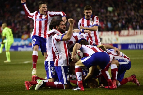 Then gets buried under ecstatic team-mates