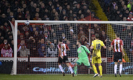 Which Sheffield United keeper Mark Howard can only watch as the ball flies past him then cannons onto the inside of the post and into the net.