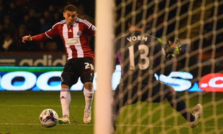 Che Adams directs his shot past Michael Vorm and Sheffield United are back in the game.