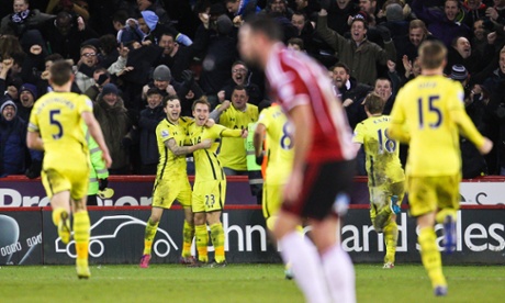 Christian Eriksen, his team-mates and the Spurs fans celebrate Eriksen, and Tottenham's, second goal.