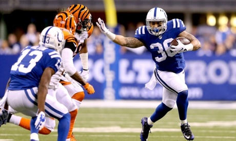 Indianapolis Colts running back Dan Herron evades defenders during his team's NFL playoff win over the Cincinnati Bengals