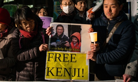People gather in front of the prime minister's residence in Tokyo to call for the release of Kenji Goto.