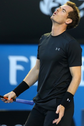 Andy Murray of Great Britain takes a point.