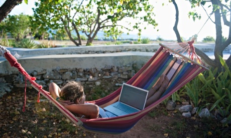 woman in hammock with laptop
