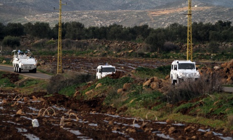 Spanish UN peacekeepers patrol the Lebanese Israeli border in the southern village of Abbasiyeh
