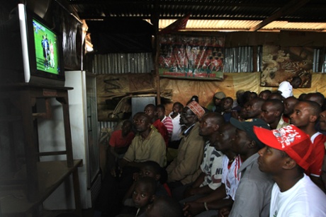 Kenyan football fans watch Arsenal and Manchester United