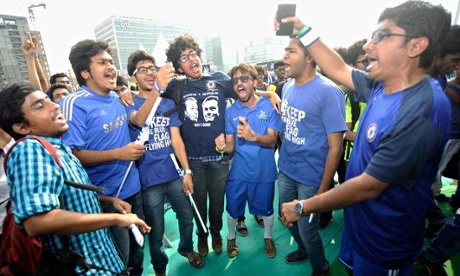 Chelsea fans cheer on their team in Mumbai, India.
