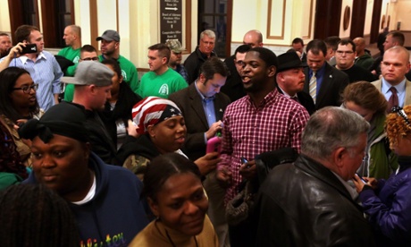 Police supporters join protesters outside the Kennedy Hearing Room at City Hall as they wait for the doors to open about an hour before a meeting on the proposed civilian oversight review board that became a melee.