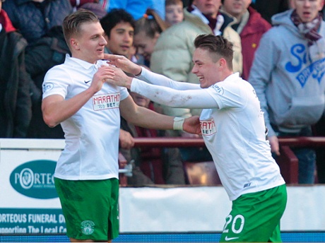 Jason Cummings, left, is congratulated after scoring.