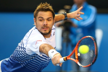 Stanislas Wawrinka plays a backhand.
