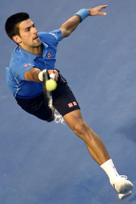Novak Djokovic reaches out for a shot.