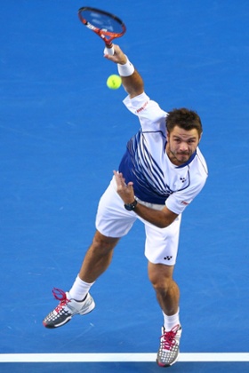Wawrinka serves.