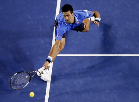 Novak Djokovic stretches out for a return.
