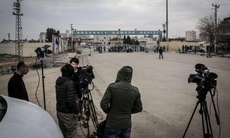 TV crews wait at the Iraq-Turkey border in Sanliurfa – scene of the proposed prisoner swap between Isis and the Jordan government.