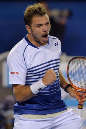 Wawrinka celebrates taking the set.