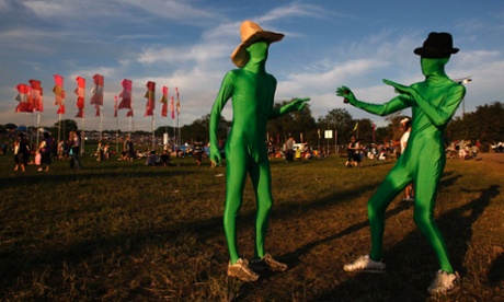 Festival-goers dressed in costume at Glastonbury 2009.