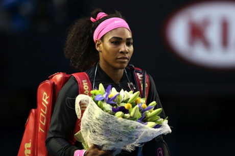 Serena Williams arrives on court. She has been struggling this week with a high temperature.