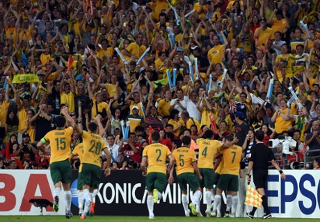 Australia's players celebrate Luongo's sublime finish.