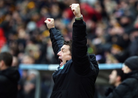 John Carver celebrates his team’s third and his first win since being confirmed as head coach.