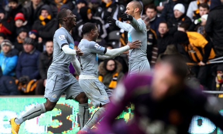 Newcastle United's Yoan Gouffran is congratulated after scoring the third goal.
