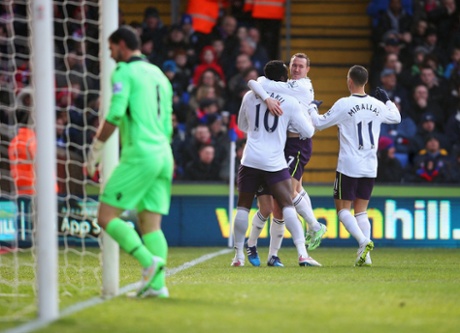 Romelu Lukaku celebrates scoring the opening goal after bundling the ball into the net.