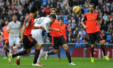 James Rodriguez scores Real's opening goal against David Moyes' Real Sociedad.