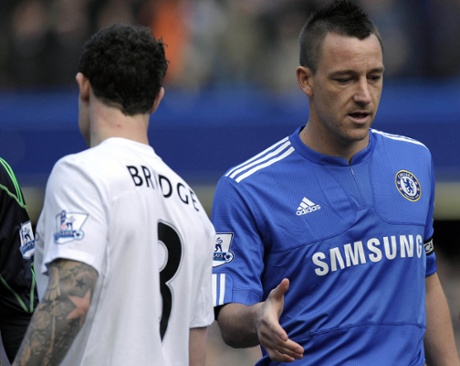 Chelsea's John Terry (R) fails to get a hand shake from Manchester City's Wayne Bridge (L) during their Barclays Premier League football match at Stamford Bridge, west London, on February 27, 2010. AFP PHOTO/Olly GreenwoodFOR EDITORIAL USE ONLY Additional license required for any commercial/promotional use or use on TV or internet (except identical online version of newspaper) of Premier League/Football photos. Tel DataCo +44 207 2981656. Do not alter/modify photo. (Photo credit should read OLLY GREENWOOD/AFP/Getty Images)HORIZONTAL