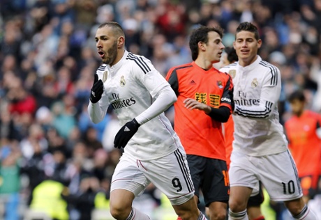 Karim Benzema scores against Real Sociedad at Estadio Santiago Bernabeu.