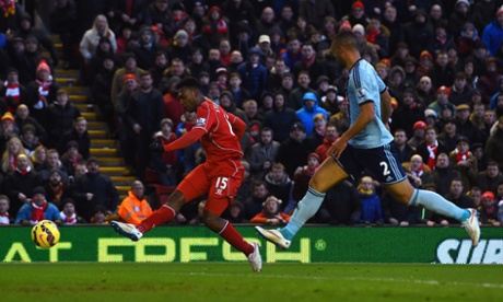 Daniel Sturridge picks up a Philippe Coutinho pass and drives the ball into the net.