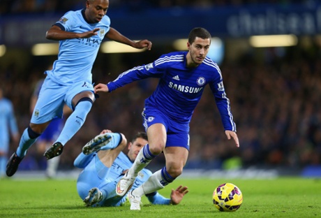 Eden Hazard breaks free with the ball as Chelsea try to break down City who are defending well so far.