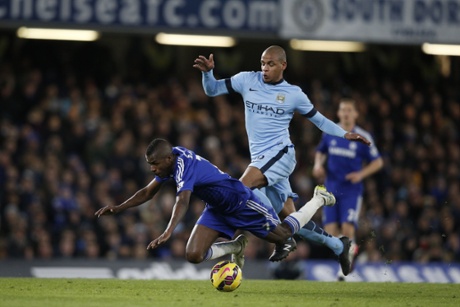 Ramires is taken out by City's Fernando.