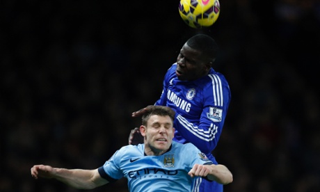 James Milner and Kurt Zouma battle for the ball.